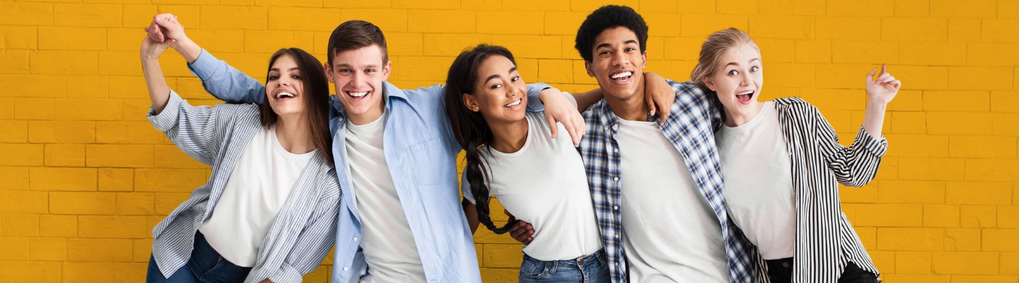 Yellow background with teens smiling with their arms around each other